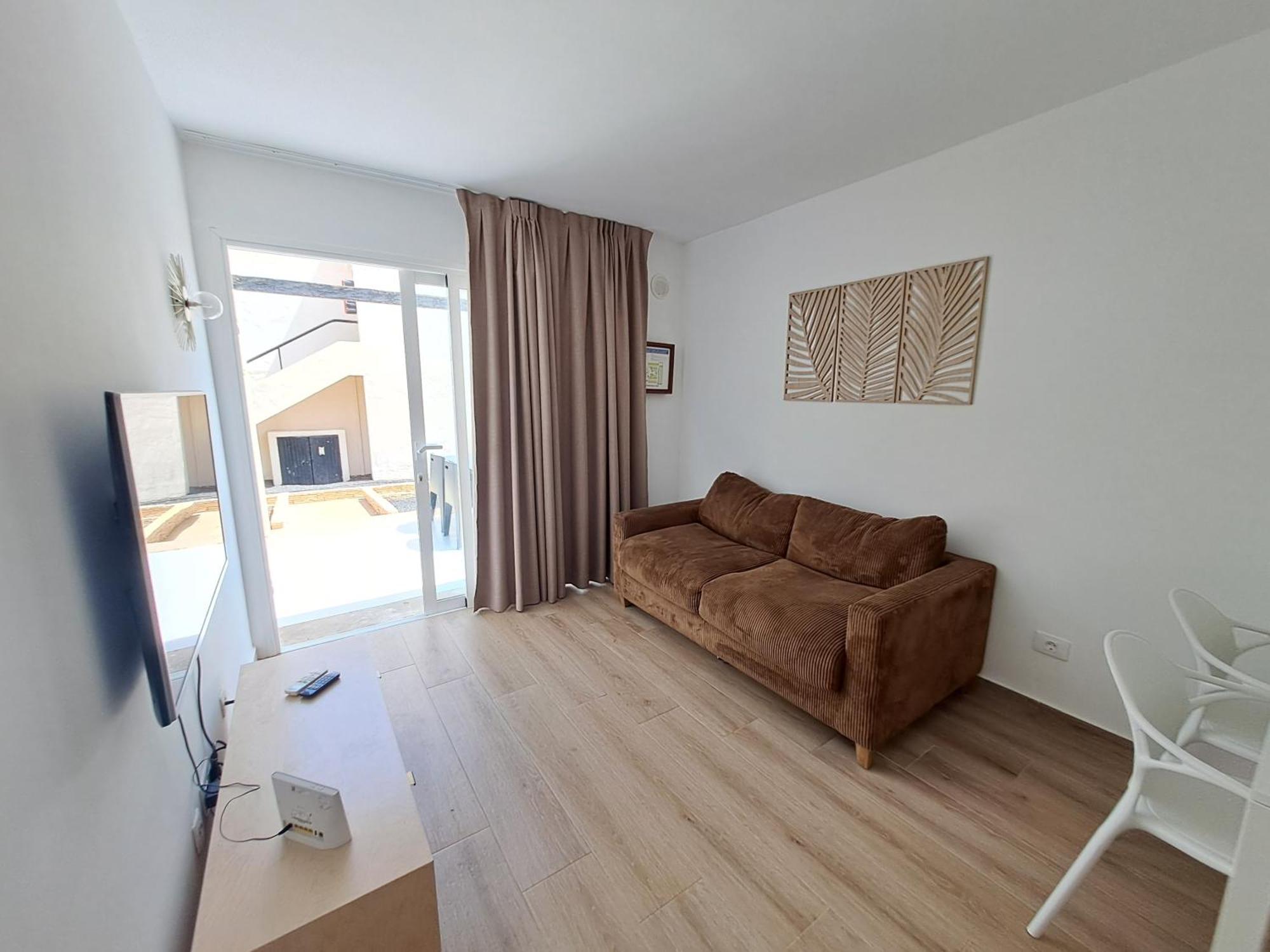 Homeforguest Apartamento Alisios 1 Con Piscina En Коральео Экстерьер фото