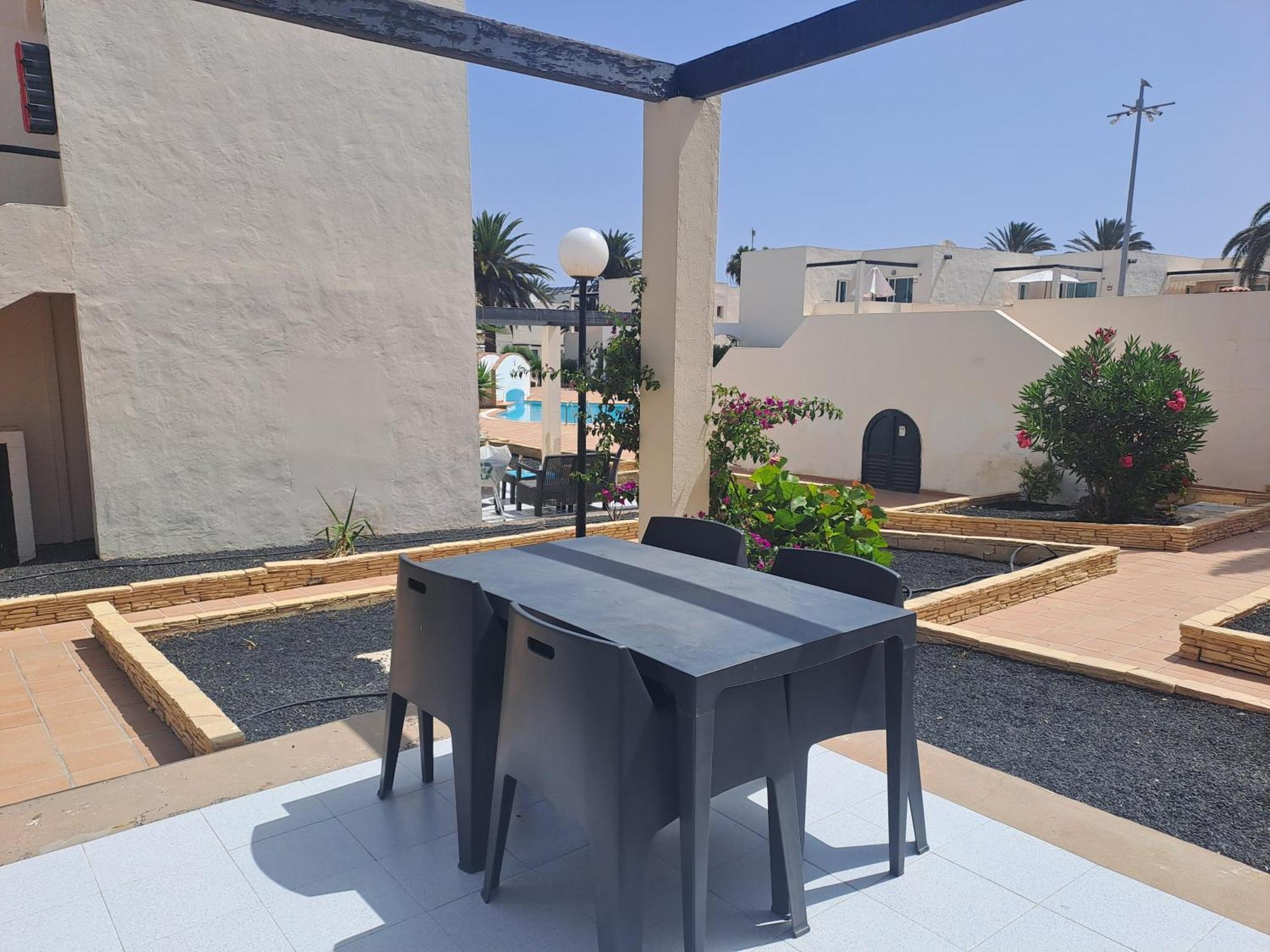 Homeforguest Apartamento Alisios 1 Con Piscina En Коральео Экстерьер фото